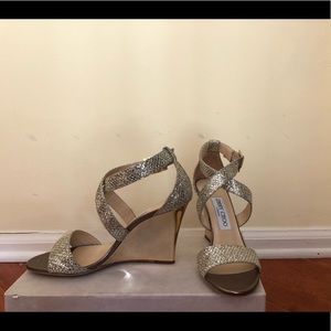 Jimmy Choo shoes with a gold wedge